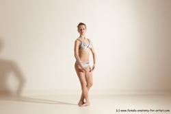 Swimsuit Gymnastic poses Woman White Moving poses Slim long brown Dynamic poses Academic